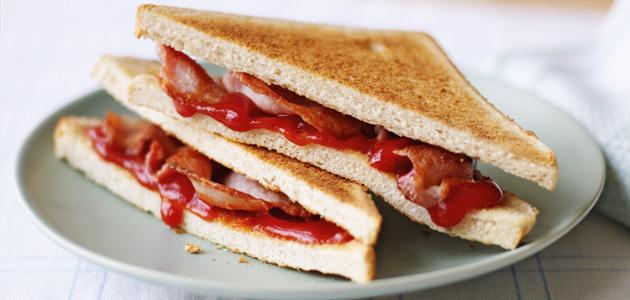 Researchers from Newcastle University in the UK found that a good old greasy bacon sandwich can help your hangover fade faster. 

Bread is high in carbs and bacon is full of protein, which breaks down into amino acids. Your body needs these amino acids, so eating them will make you feel good!