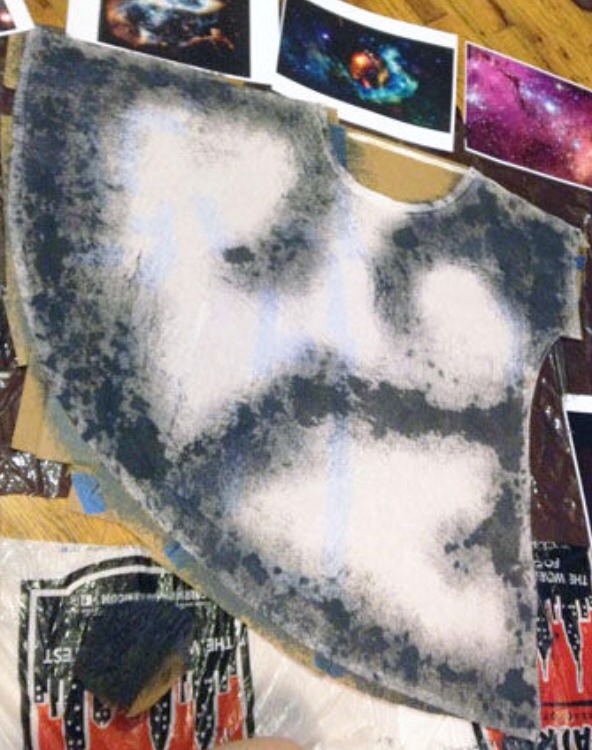 Dab paint on like this. Start with the darkest color on the bottom. You can use red, blue, green, brown etc-- it all looks intergalactic. 