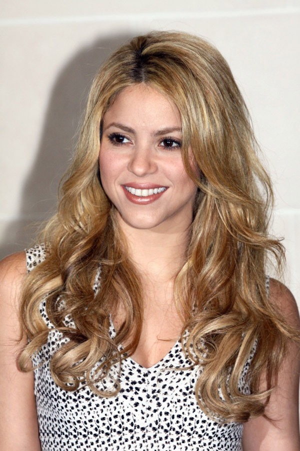 While curling your hair with a curling iron, always start from the middle part of your hair to make the curls last all day.