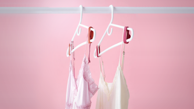 7. Tie rubber band around each end of a clothes hanger to keep your clothing from falling off the hanger.