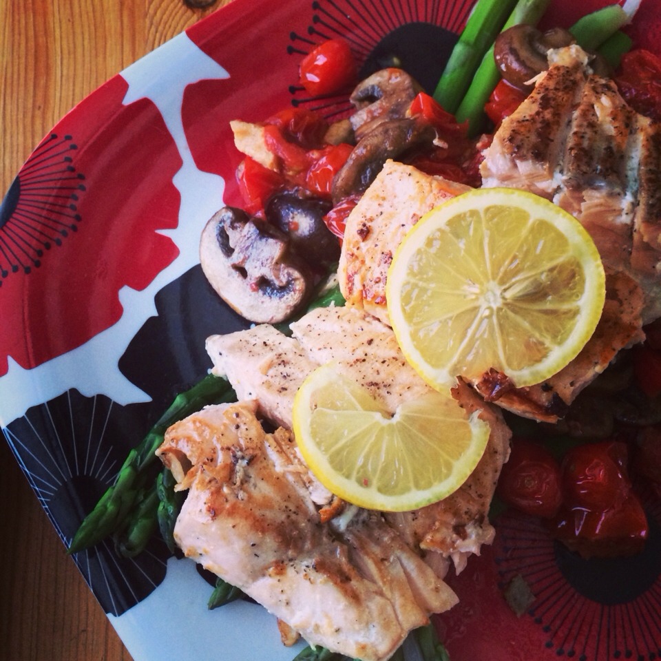 Add asparagus to a shallow pan with drizzled olive oil heat oven to 425 for 5 minutes and combine vegetables and salmon together on a plate for a delicious quick simple meal!