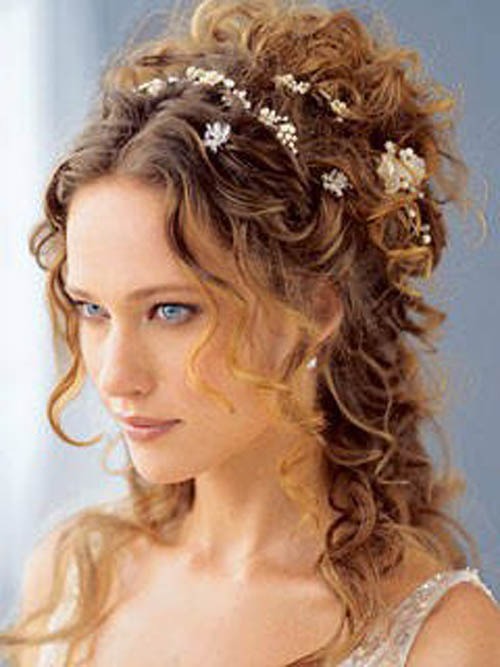 The Roman half up do!
Very romantic and beautiful!
Perfect for special occasions like weddings and Sweet 16s!
Accessorize your hair with clips like shown in the picture to add elegance and more!