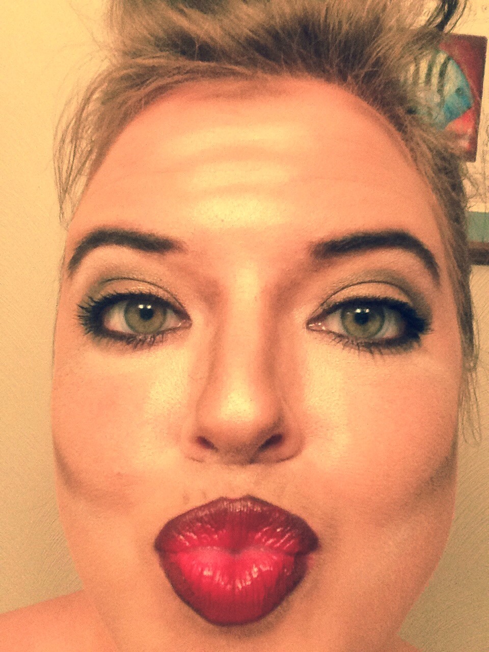 Blow yourself a kiss.