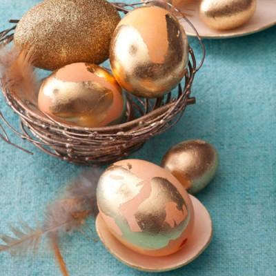 Golden Eggs

MATERIALS: Faux gold-leaf kit (dickblick.com), 2 small paintbrushes, hard-boiled eggs (dyed)
