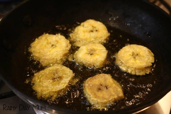 Once all of the slices are flattened. Heat up the oil in the bottom of a frying pan, and then add a few slices at a time. T is under 4 so I did this part as the oil can spit, and I didn’t want her to be burnt, however with older children you can help them. 