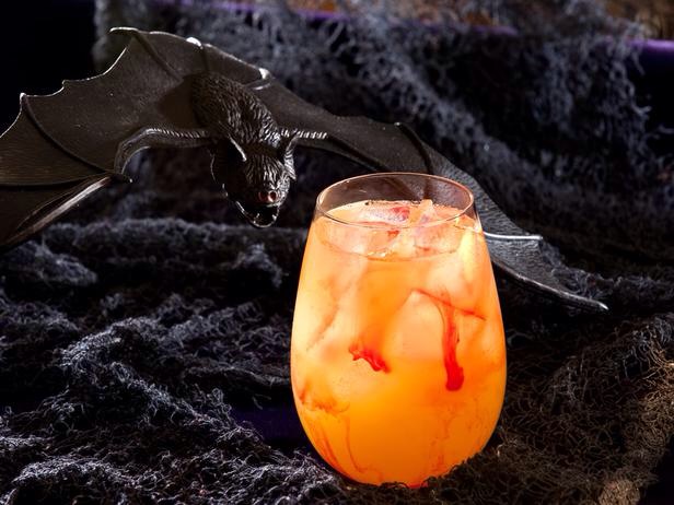 Blood Sucker Cocktail
To create this vampire-friendly cocktail, shake up triple sec, vodka and pineapple juice, then strain and pour into a glass. Drip strawberry or raspberry puree along the sides of the glass to add streams of 'blood.' 