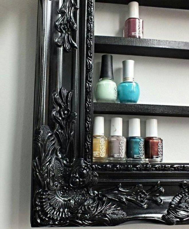 Easy nail polish display: Take an old picture frame and hammer some simple shelves to the back.