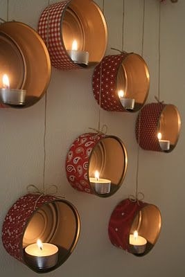 Take tuna cans, decorate them, and add a candle 