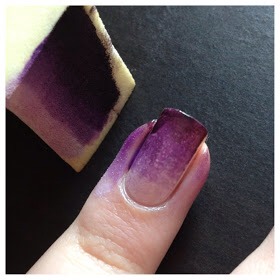 Step 3: Line your sponge up on your nail and press down. If you like where all of your colors are placed, you can then blend the colors by bouncing the sponge on top of the nail. Be careful. You don't want to over-do it or the sponge will start to pull your color up instead of laying it down.

