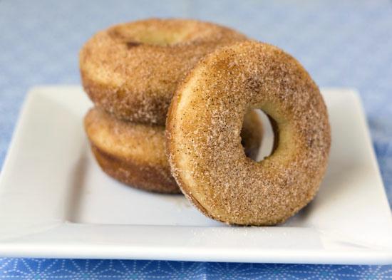 Maple Cinnamon-Sugar Baked Donuts ~ Warm maple and cinnamon flavored donuts that are baked and not fried.  Much easier and healthier to make and still have the airy donut texture.  Yummy!