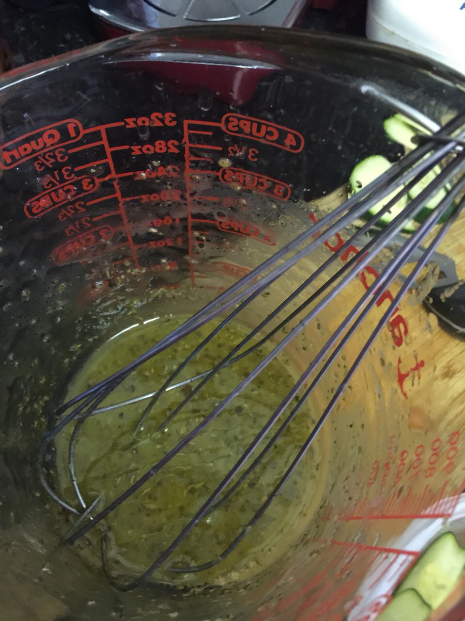 First make your dressing.
In a cup measure:
2 Tablespoons of extra virgin olive oil
3 Tablespoons white wine vinegar
1/2 teaspoon oregano
1/4 teaspoon basil
1/8 teaspoon sea salt
Whisk well until completely blended & set aside