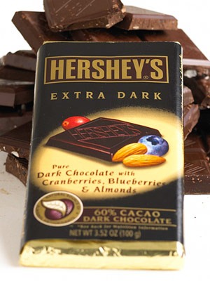 Dark Chocolate
We won't judge you if you keep a secret stash of chocolate in your purse or desk (or both). In fact, we recommend you do -- especially if you're willing to share. Dark chocolate helps skin stay hydrated and protects skin from sun damage.