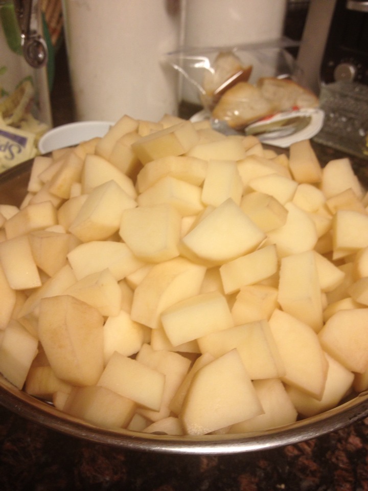 Start by boiling some water then peel & cut 6 large potatoes 
