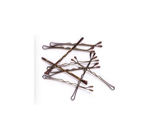 Bobby Pins. Your hair is your baby, your baby must be restrained, and not running off into wild world of static electricity. So welcome to your life saver. 💁