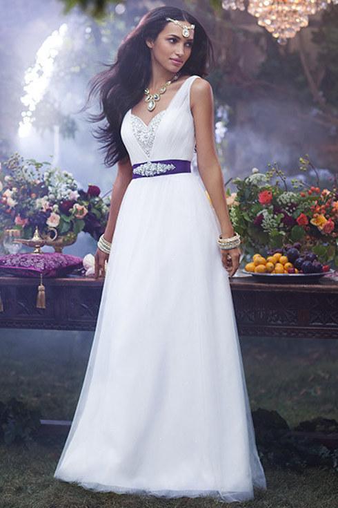 5. Jasmine
The embroidery on this dress is incredibly dainty, all tied together with a dramatic ribbon at the waist.