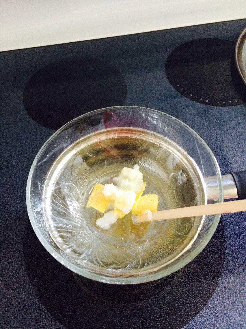 In a double boiler, on low heat you put all your ingredients together, 
1 tea spoon of coconut oil, 
1 tea spoon of vaseline,
1 tea spoon of shea butter,
1 tea spoon of Bees wax 

And then you add a couple of drops of vitamine e oil and just a tiny bit of Honey. You can fill with these quantities.