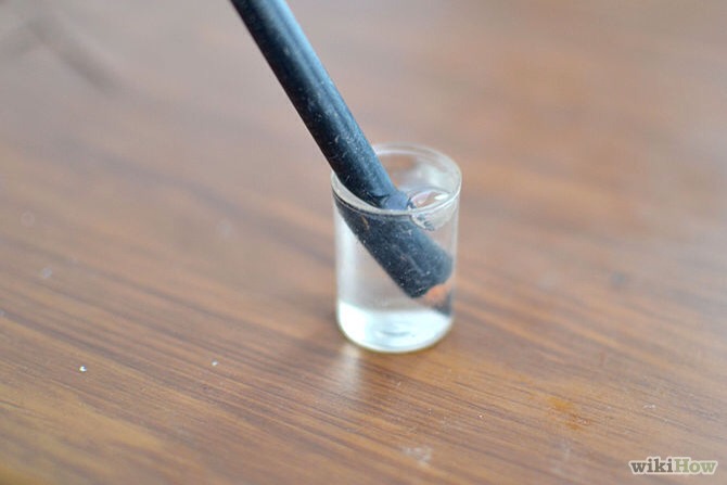 Place the pencil in the water an wait about 20 - 30 seconds. (Depending on how much you want to come off.)