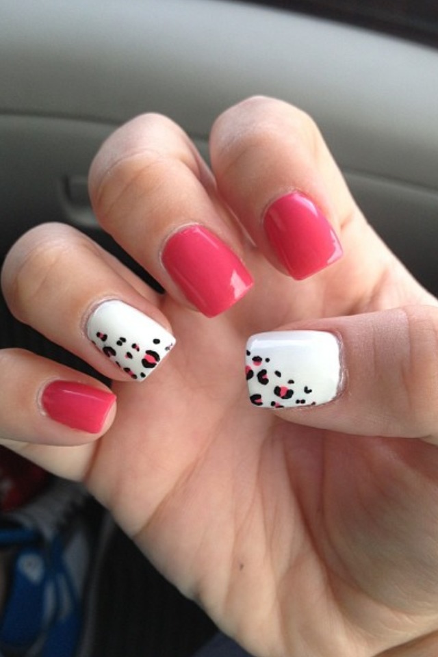 Apply any color to your middle, index and pinky nail. With a dotting tool, put little dots where you want the bigger prints. Clean tool. Apply black around the colored dots. Remember! The print doesn't have to be perfect...real animal prints aren't. 