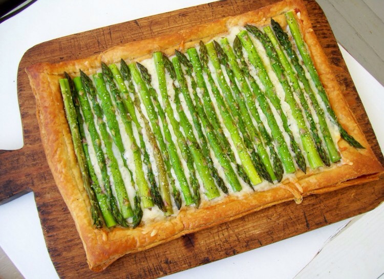 ASPARAGUS GRUYERE TART
Having trouble finding a way to make asparagus tasty? Look no further! With just a sheet of puff pastry, 2 cups of gruyere cheese, and a tablespoon of olive oil you can turn bland asparagus into a delicious, cheesy pastry.