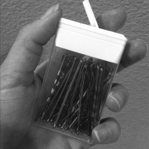 You could also put hair grips in a small pot like a tic tac pot!