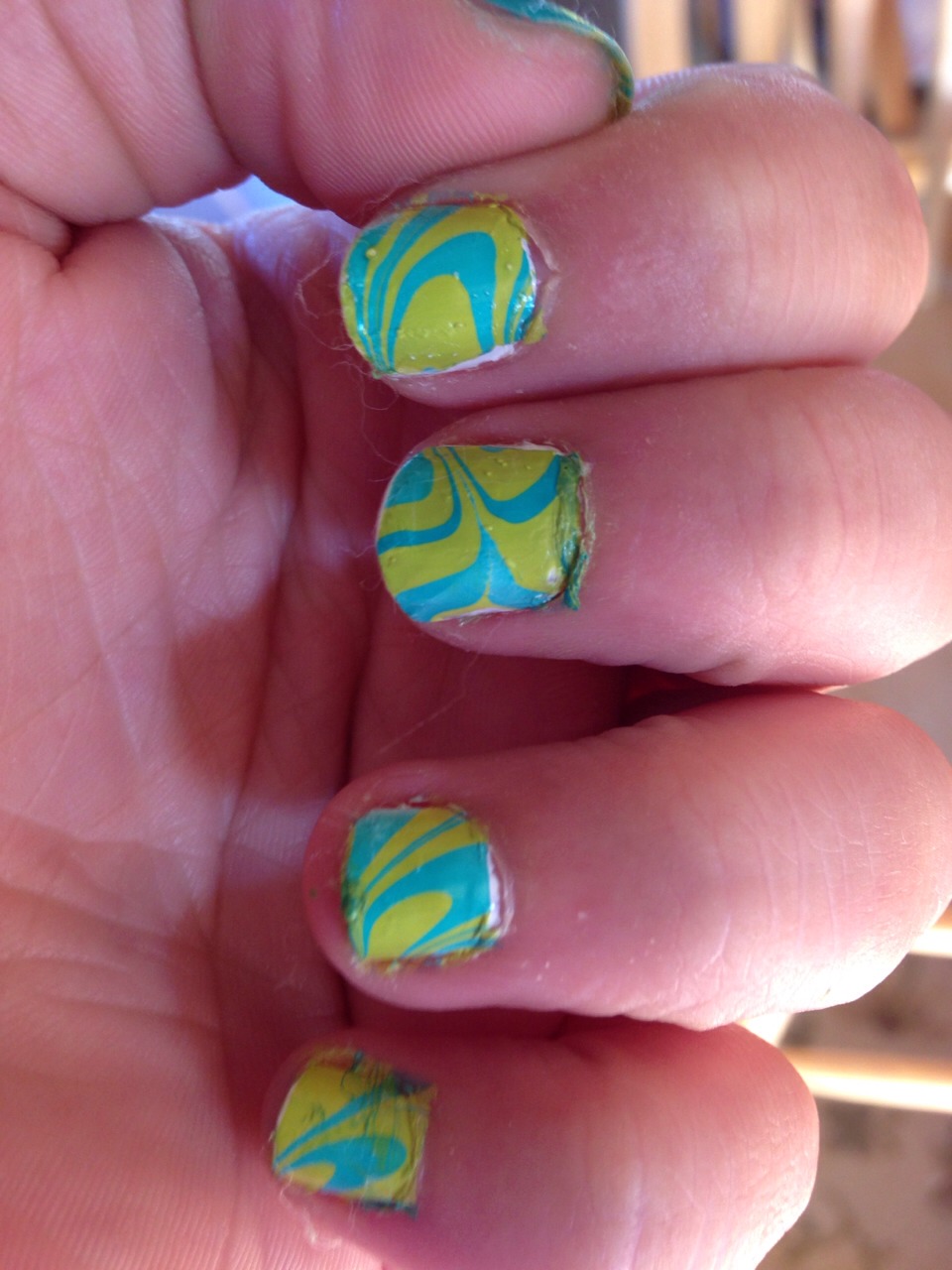 Off the tape and cleaning your nails (I haven't clean mine yet) 