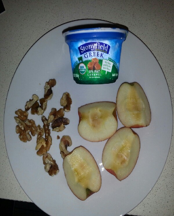 snack between breakfast & lunch. greek yogurt,apple & a few walnuts.