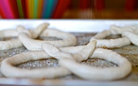  Place on a greased baking sheet and sprinkle with coarse salt. 