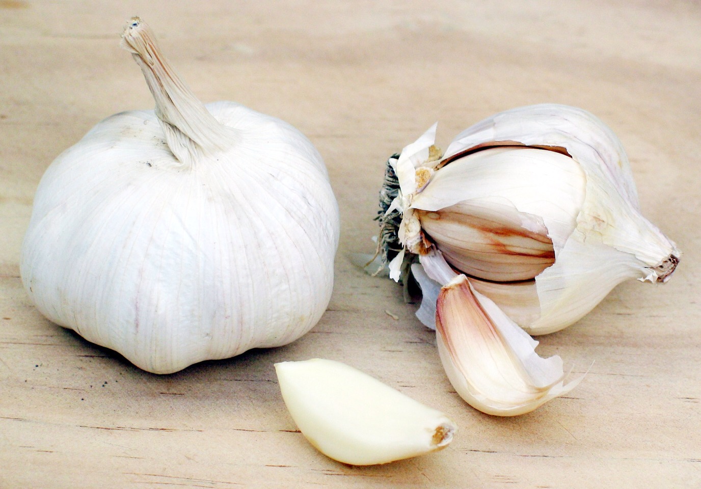 Yes my dear GARLIC! peal a garlic clove cut it in half and massage it on your nails! Do it twice everyday and you'll have long nails in about a week/week in a half. Trust me you'll see the difference :)