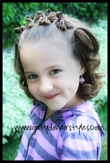 http://www.girlydohairstyles.com/2012/05/flowers-in-hair-part-two.html?m=1
