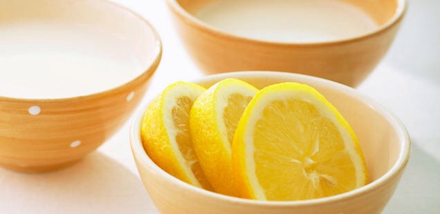 Combine parts baking sod and lemon juice in a bowl. Use a cotton ball to dab the solution on your teeth. Leave it on for a minute then brush off