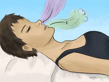 (9)Use breathing techniques. 
Deep breathing can help you relax enough to fall asleep. Lie on your back in bed, watching or feeling your stomach rise, and then breathe. 