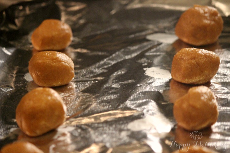 Roll your cookies into balls about 1/2in. thick and place them on the foil. Make sure they are not too close together!