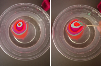 Layer the colors one on top of the other. Take a toothpick and pull out out the polish to create a swirly pattern, starting from the center. Work quickly as the polish will start to harden and clump up over time.