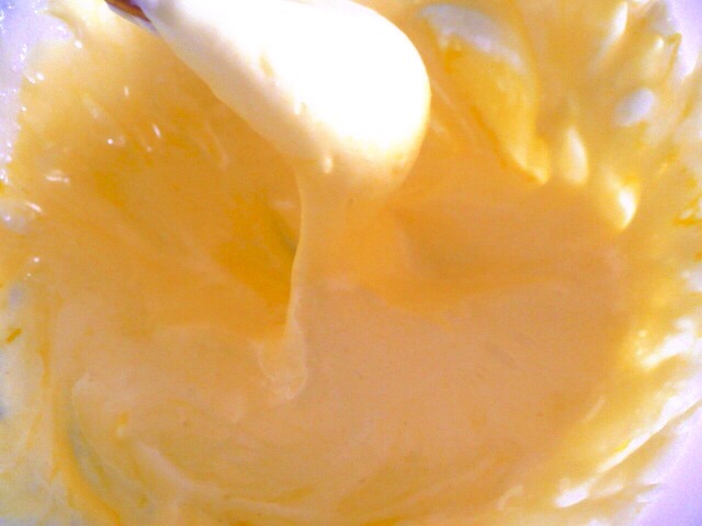 Stick the marshmallows in the microwave for ten seconds at a time until the are puffed up and easily stir into a goo with a wooden spoon. Tip: Grease your spoon with butter, things can get a bit sticky.
Add food colouring  to the melted marshmallows until you get the colour you want.
