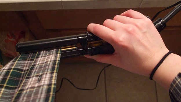 Use a flat iron to quickly iron your clothes