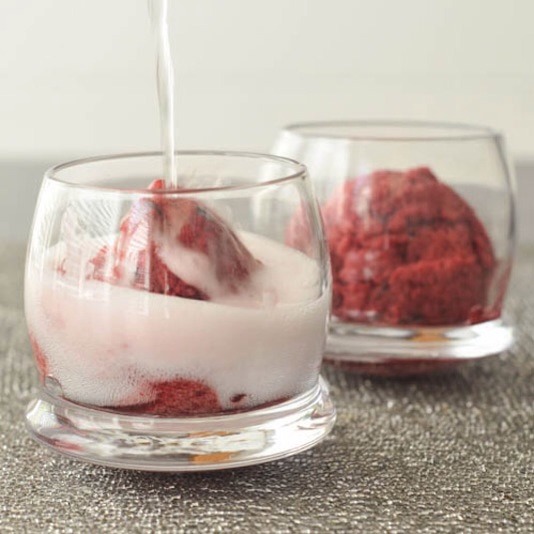4. Cherry Sorbet Champagne Floats
Forget root beer floats; champagne is infinitely more fun and pairs beautifully with cherry sorbet.