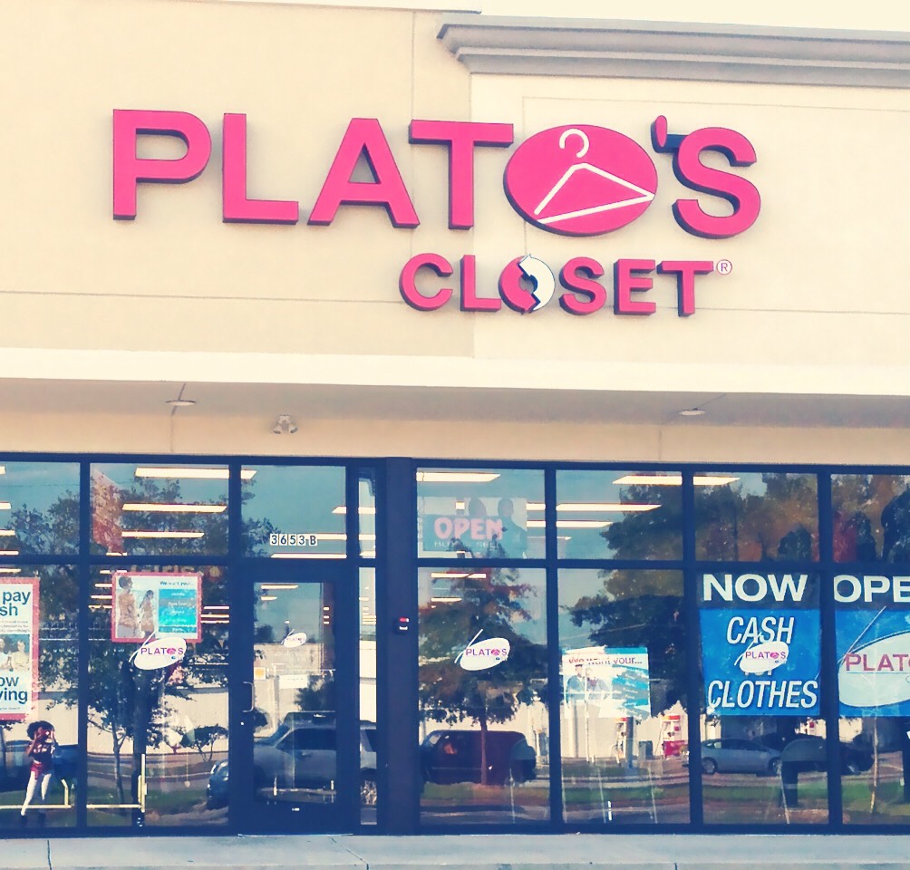 Plato's closet is a store they buys and sells clothes cheap, you can sell old clothes here if they accept it, don't expect to get rich because they need to sell clothes cheap but also make a decent profit, but it's better than having clothes you don't wear sitting around 