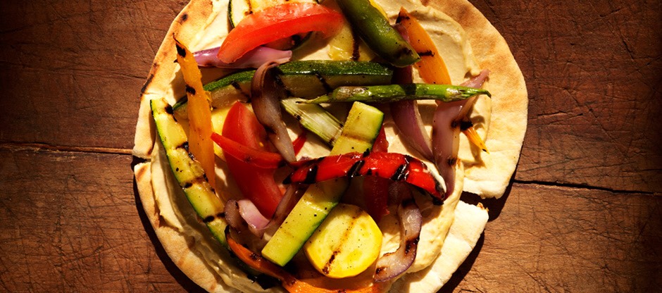 Whole wheat pita and hummus with veggies. Hummus is made from chickpeas and is absolutely amazing as a spread or dip. It's as satisfying as fatty dips and has much less calories. I've even made my own and experimented with flavors and recipes. Definitely recommend trying it if you haven't yet!
