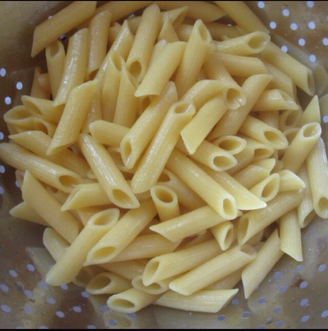 Drain pasta into a colander