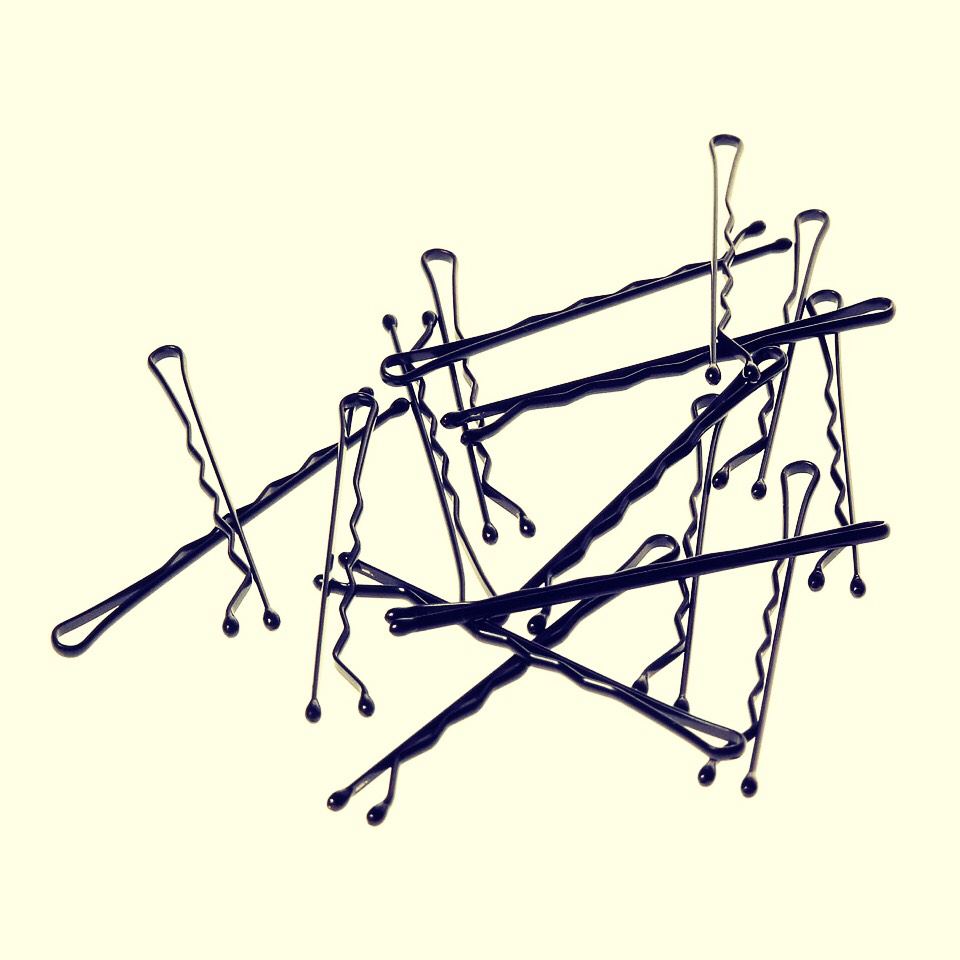 Spray hair spray on bobby pins to make them stay in your hair!