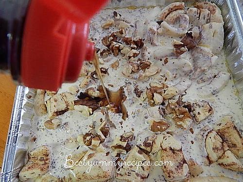 Sprinkle with pecans and drizzle 3/4 cup syrup over the top.