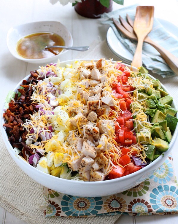 Classic Cobb Salad with Red Wine Lemon Vinaigrette

This salad has everything but the kitchen sink, and promises to satisfy any craving you have! Not to mention it's stunning — the perfect dish to bring for your next summer potluck.
