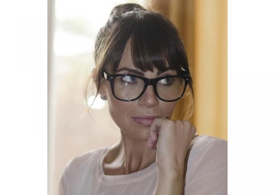 If you have bangs, try this look on for size. Keep the focus on the top half of your face by pulling your hair into a bun, and going with bold eyebrows, layers of mascara, and dark eyeliner.