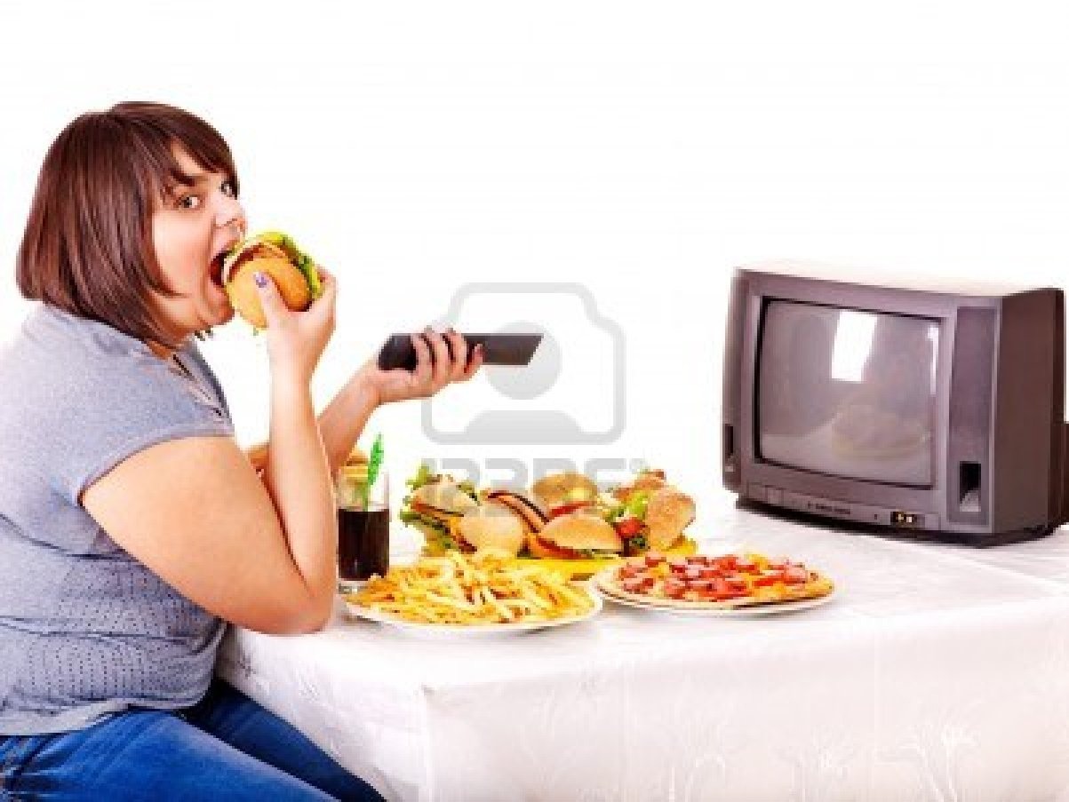 Turn off the tvand resist

When eating with the tv on you take in about 40% more calories because you consume more when your not paying attention to what your eating. So watch how much you eat and resize how much food you eat.