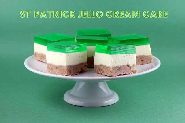 St. Patrick Jello Cream Cake ~ I absolutely adore layered jello, and this recipe looks to die for.  The ingredients are simple. Jello, cream cheese, heavy whipping cream and a little more sugar.  Sounds delicious, right?
