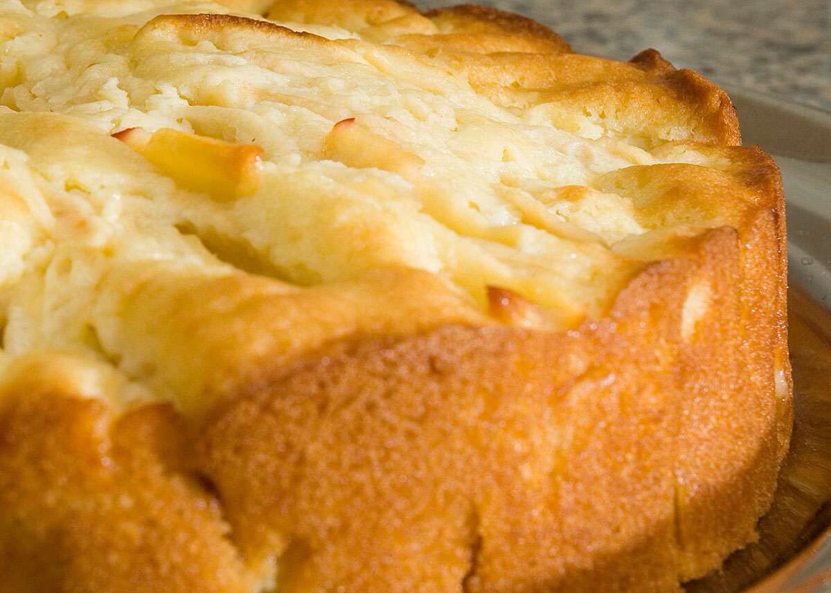 Preheat oven to 350 
Grease and flour 9x13 pan
Mix together eggs and oil until creamy with electric mixer.
Add in sugar, brown sugar and vanilla and mix together.
Add flour, salt, baking powder and continue to mix. Batter will be very thick and dense!
Fold in apples with a spoon.