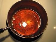 Caramelize a half cup of sugar