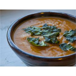 In a blender, blend the soup in batches to a smooth or slightly chunky consistency, whatever you prefer. Serve with basil leaves.
All done! Now take a photo, rate it, and share your accomplishments!