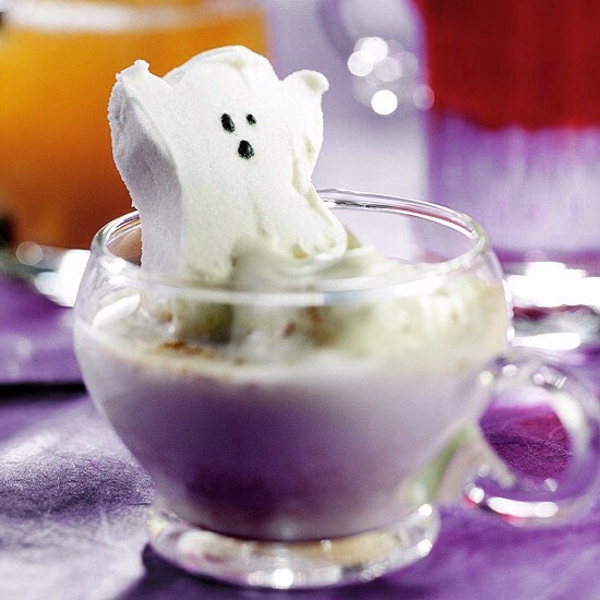 Haunting Hot Chocolate
This hot white chocolate drink looks even spookier with a ghost-shape marshmallow floating in it. Warm up your guests -- and frighten them a bit too -- with this hot Halloween concoction.
