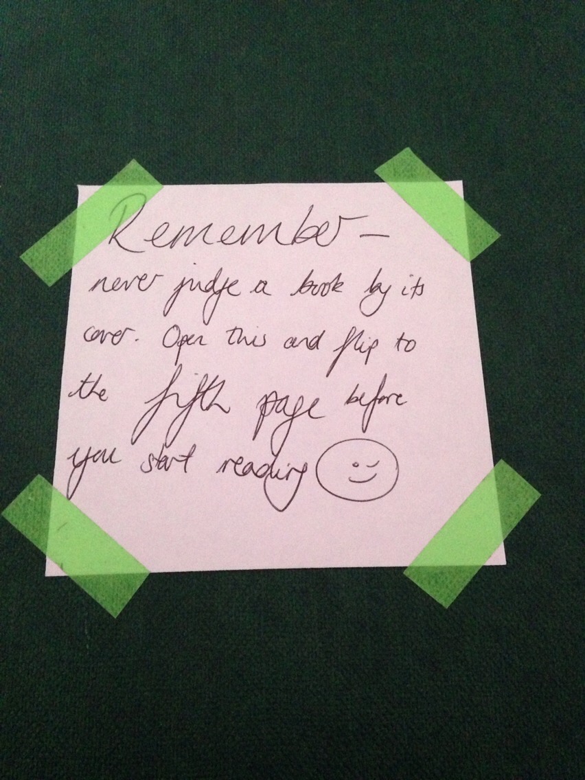 Tape a small note to the front of the book.